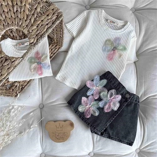 دوتیکه تیشرت و شلوارک دامنی طرح گل 3 سال تا 10 سال کد 9558 (221181)